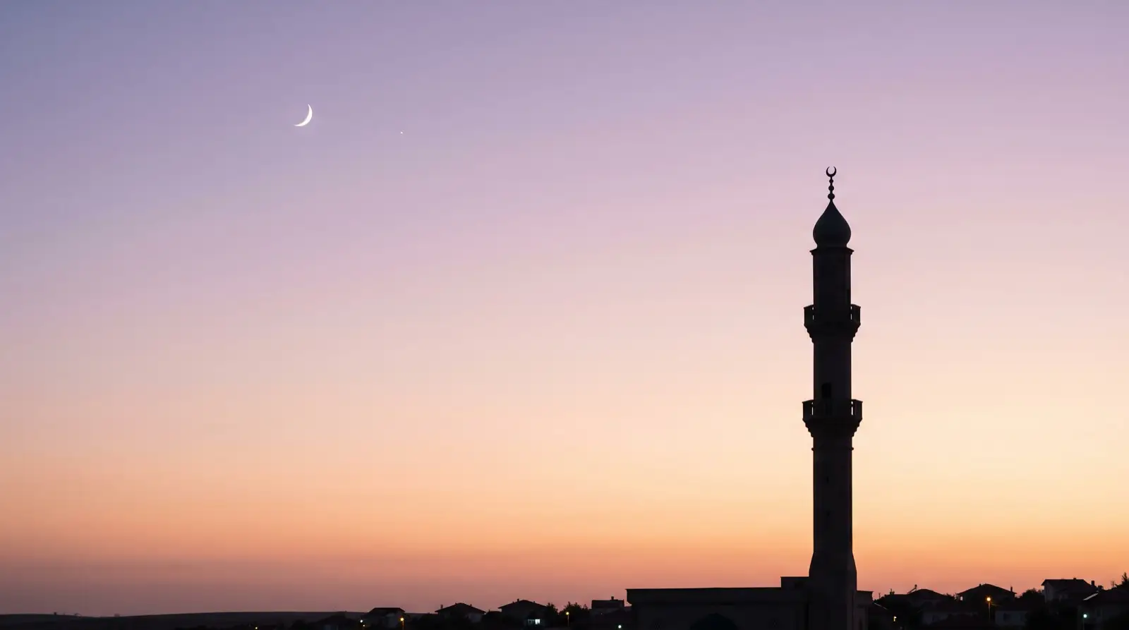 A slim crescent moon and one faint star in a lavender-to-peach dusk sky above the silhouette of a slender minaret.